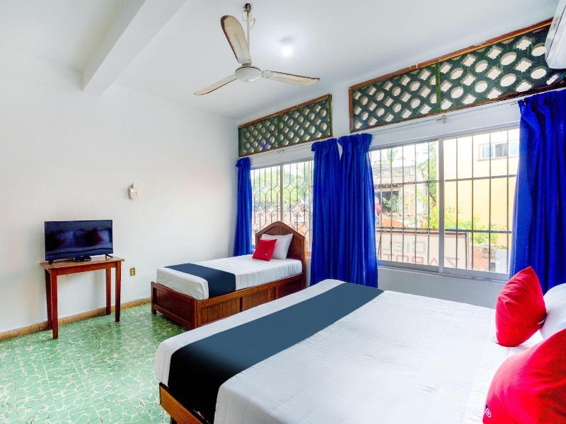 Capital O Hotel Adelita image