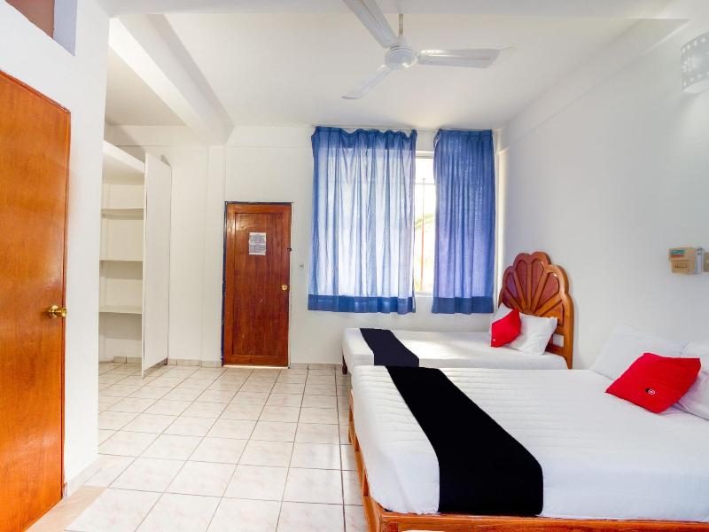 Capital O Hotel Adelita image