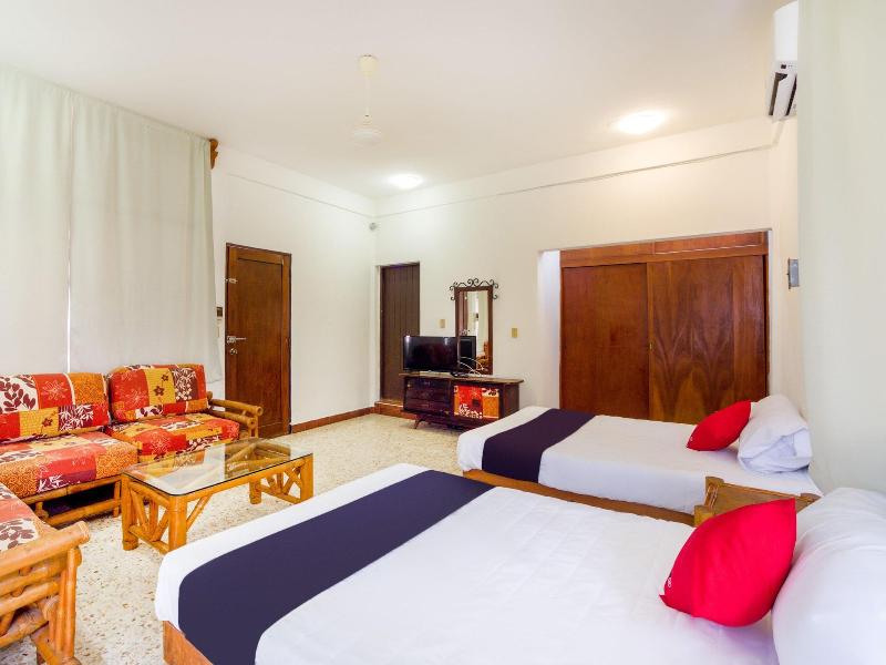 Capital O Hotel Adelita image