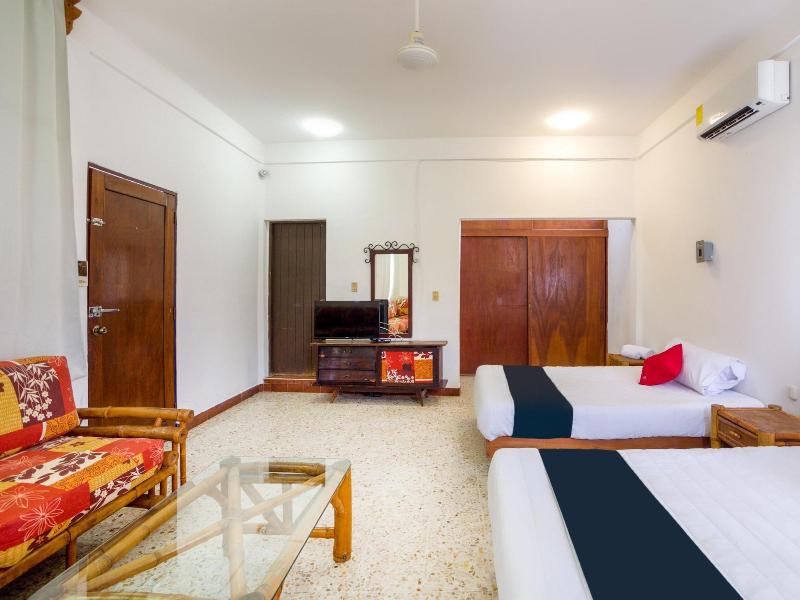 Capital O Hotel Adelita image