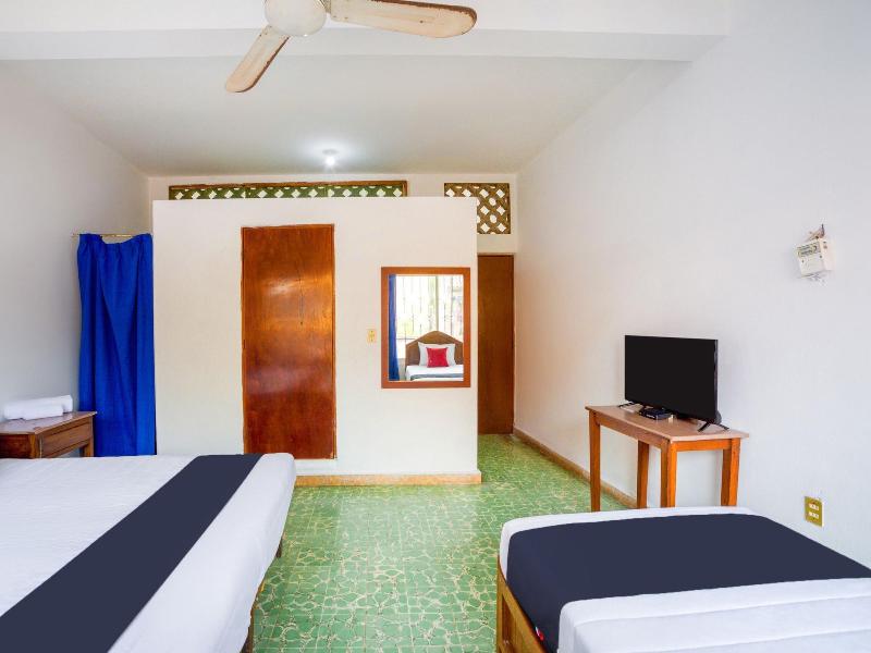 Capital O Hotel Adelita image