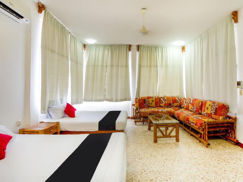 Capital O Hotel Adelita image