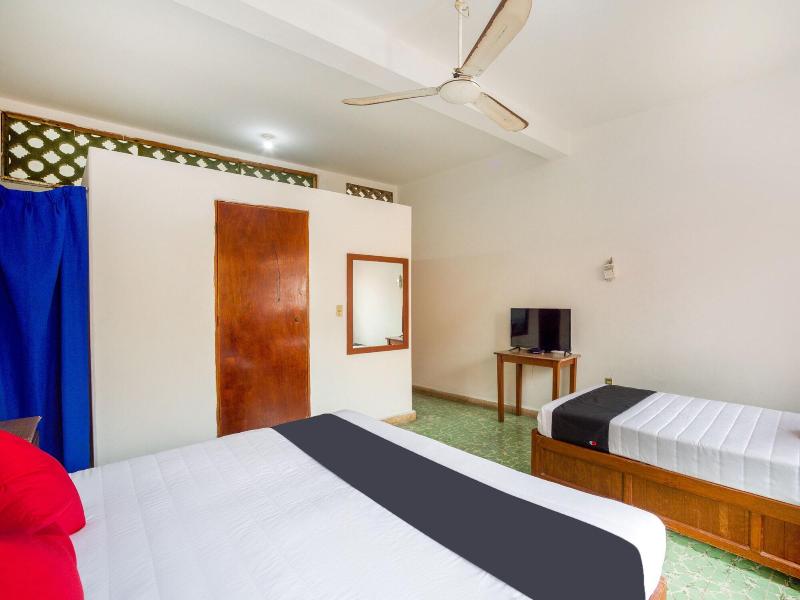 Capital O Hotel Adelita image
