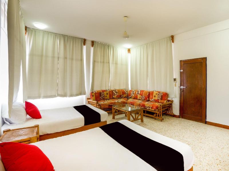 Capital O Hotel Adelita image