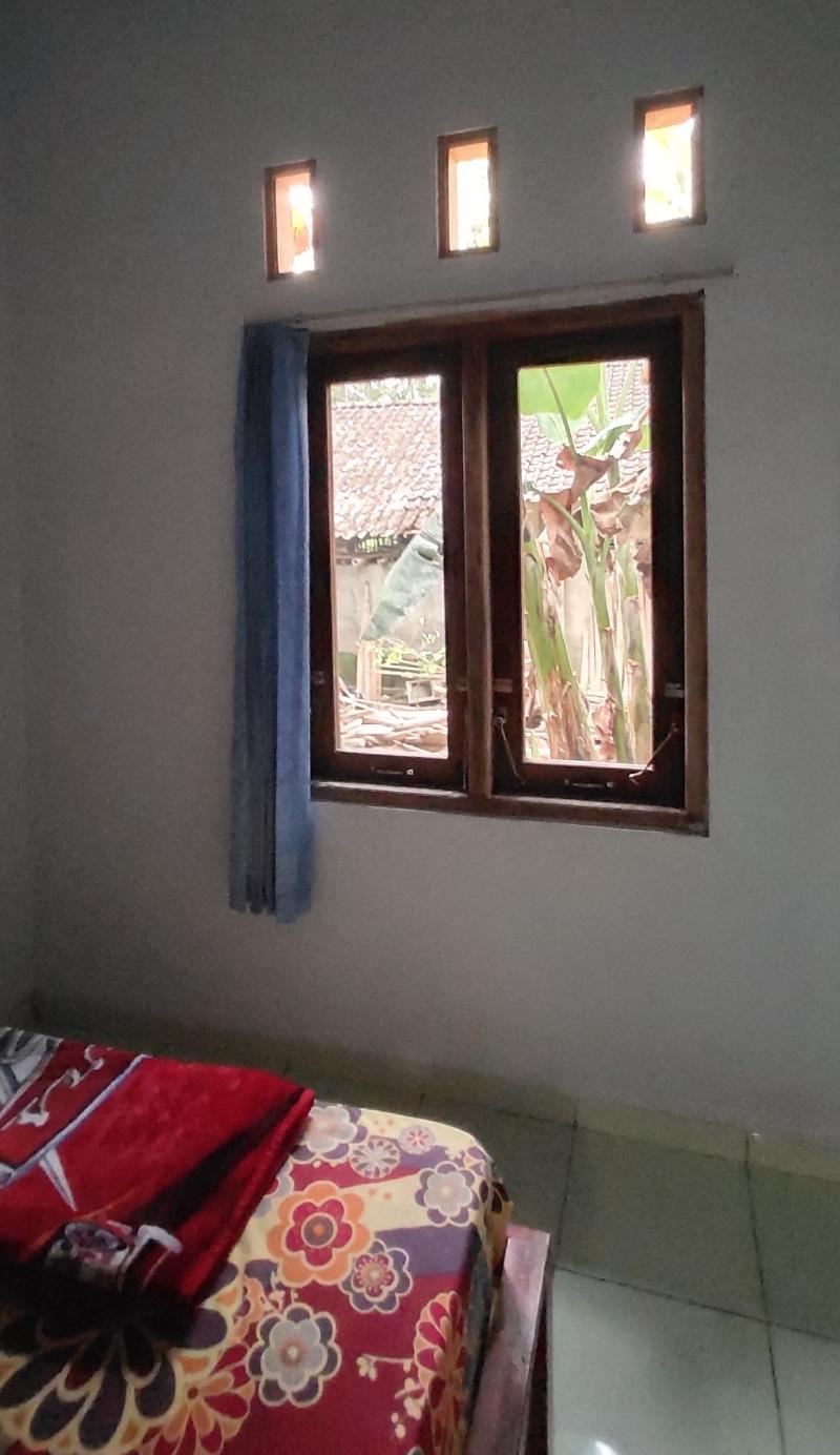 Homestay Adam by ZUZU