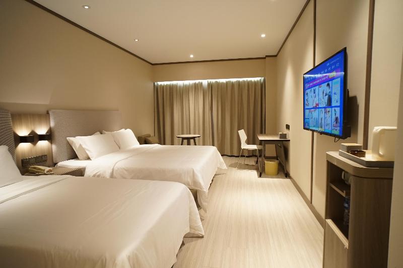 Hanting Hotel  Haining Haichang Road Railway Stati image