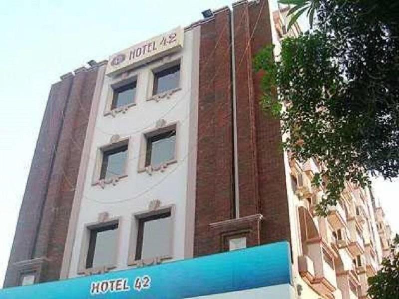 Capital O 15395 Hotel 42
