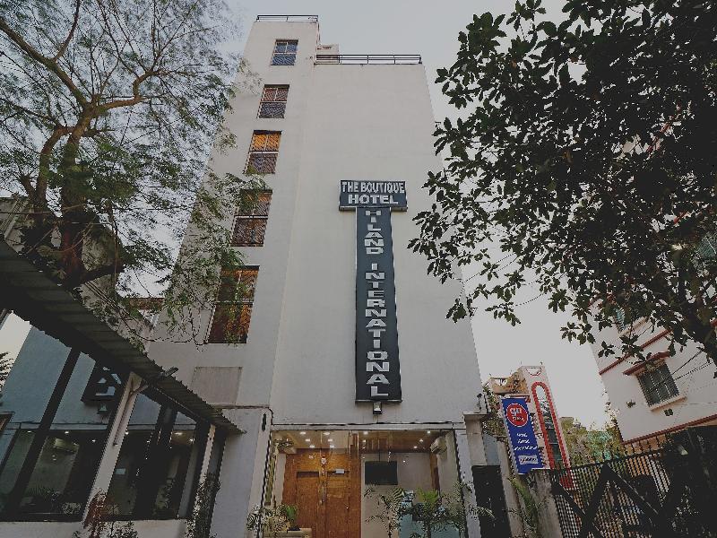 Capital O 7743 Hotel Hiland International image