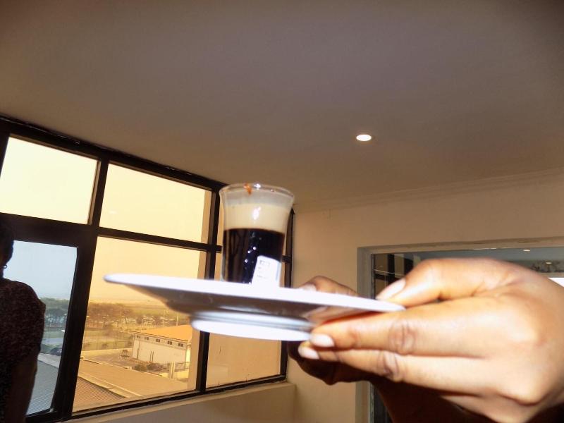 Posh Hotel And Suites image
