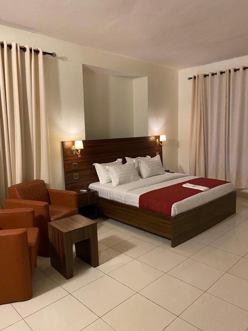 Posh Hotel And Suites image