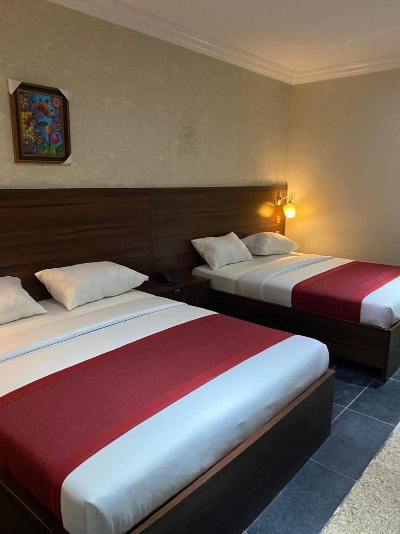 Posh Hotel And Suites image