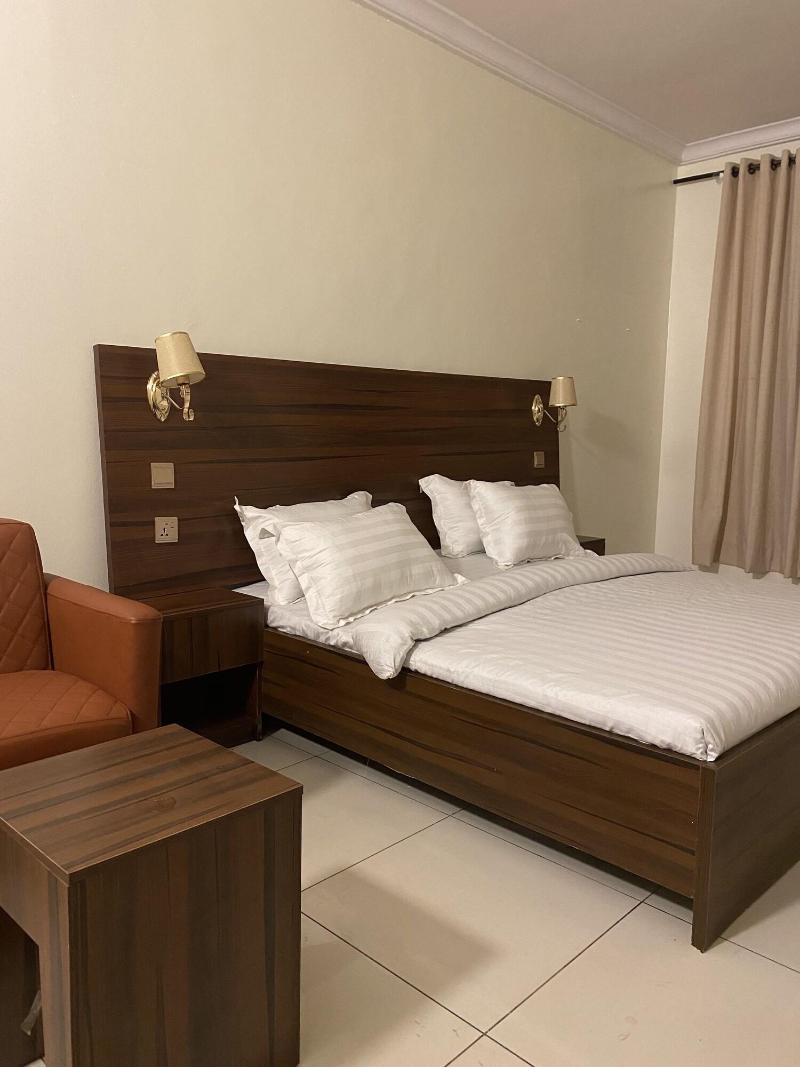 Posh Hotel And Suites image