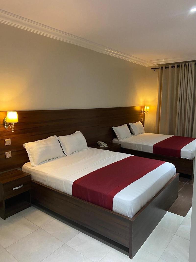 Posh Hotel And Suites image