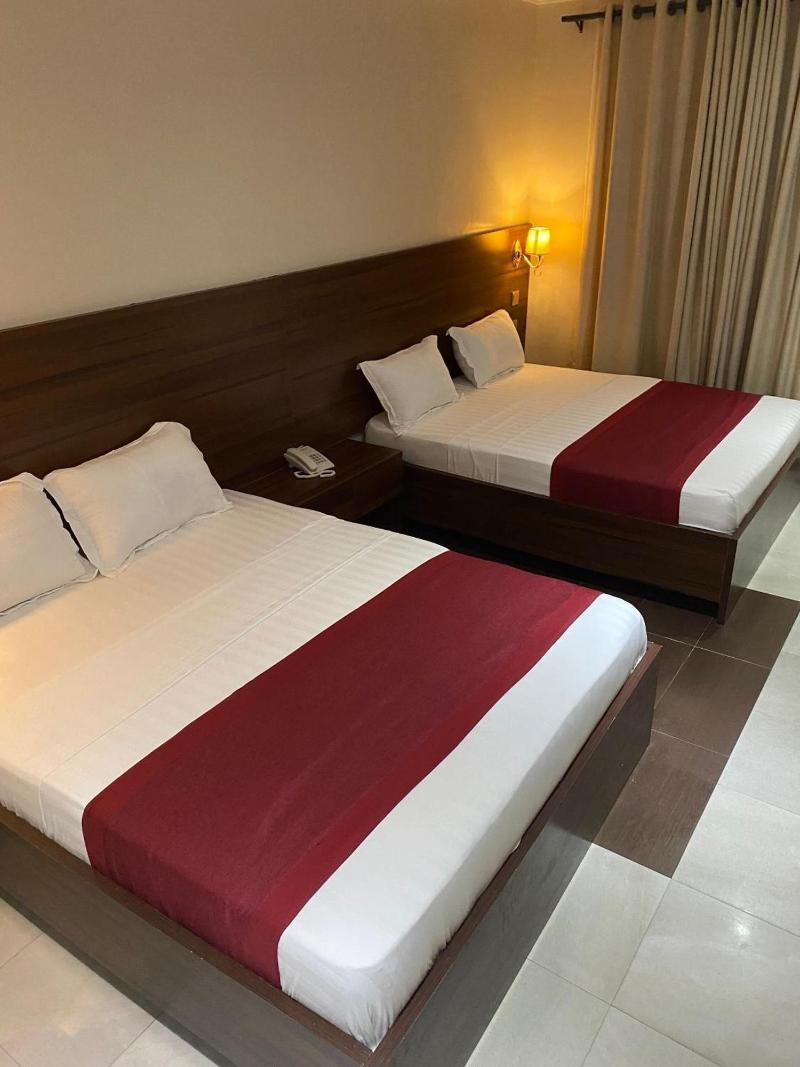 Posh Hotel And Suites image