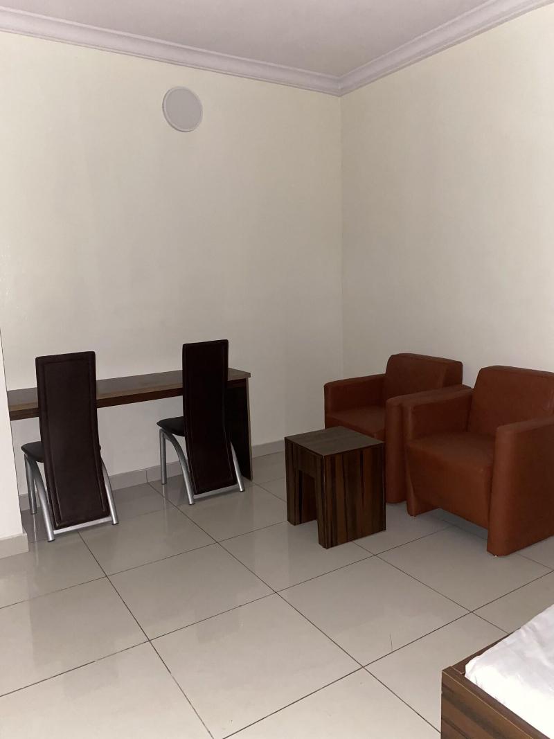 Posh Hotel And Suites image