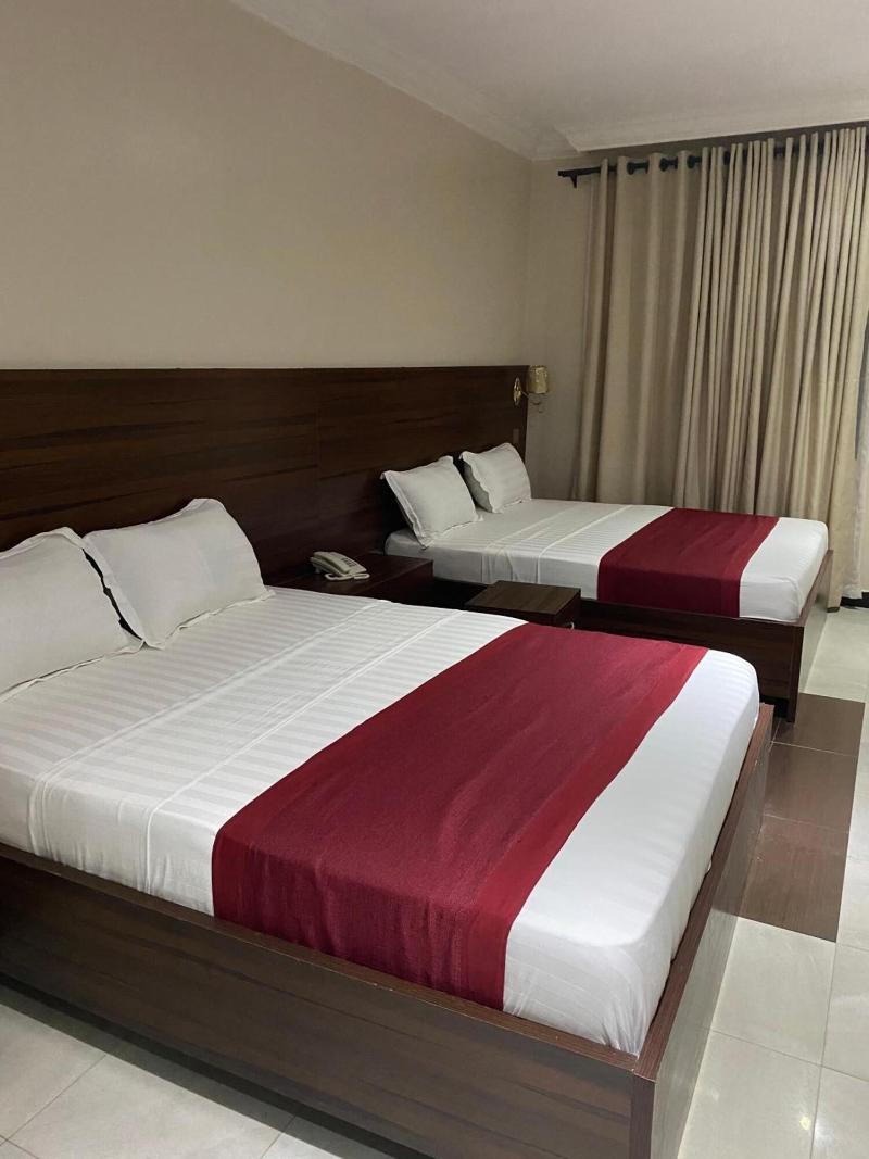 Posh Hotel And Suites image