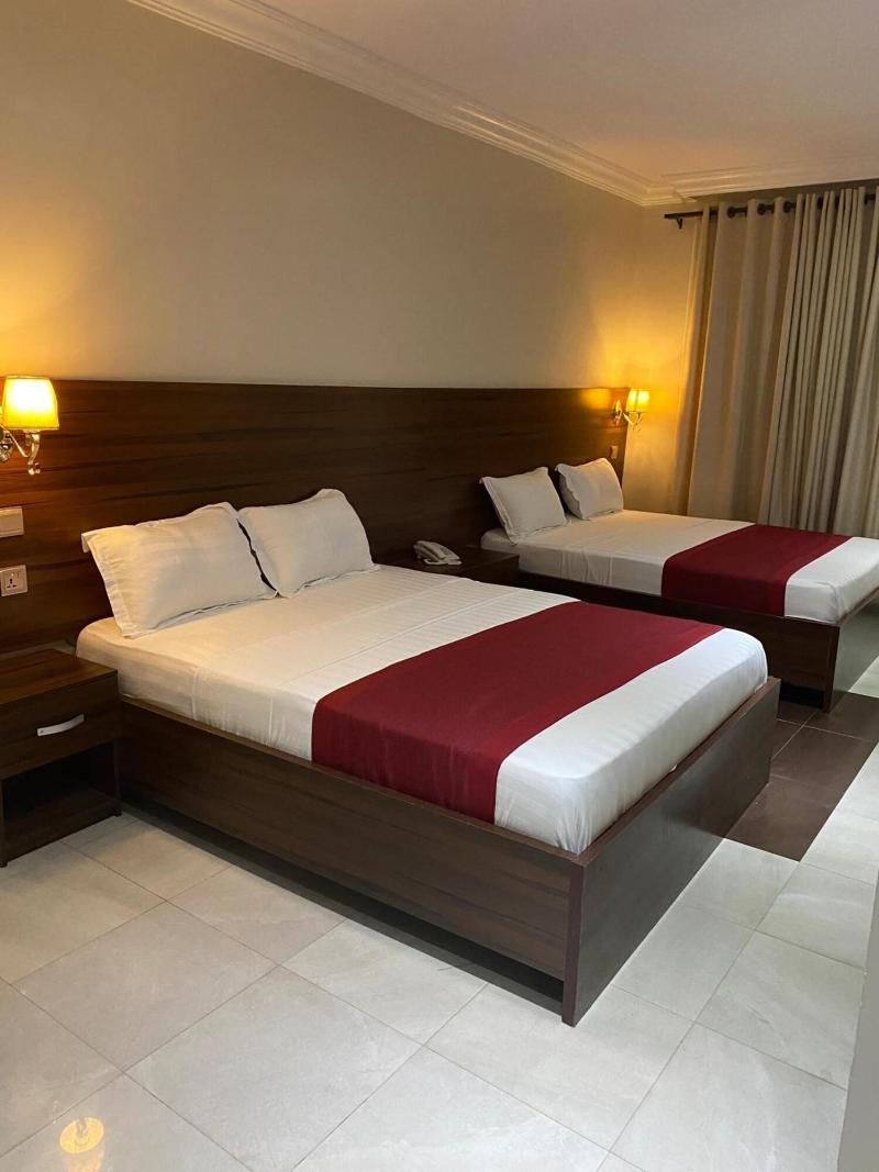 Posh Hotel And Suites image