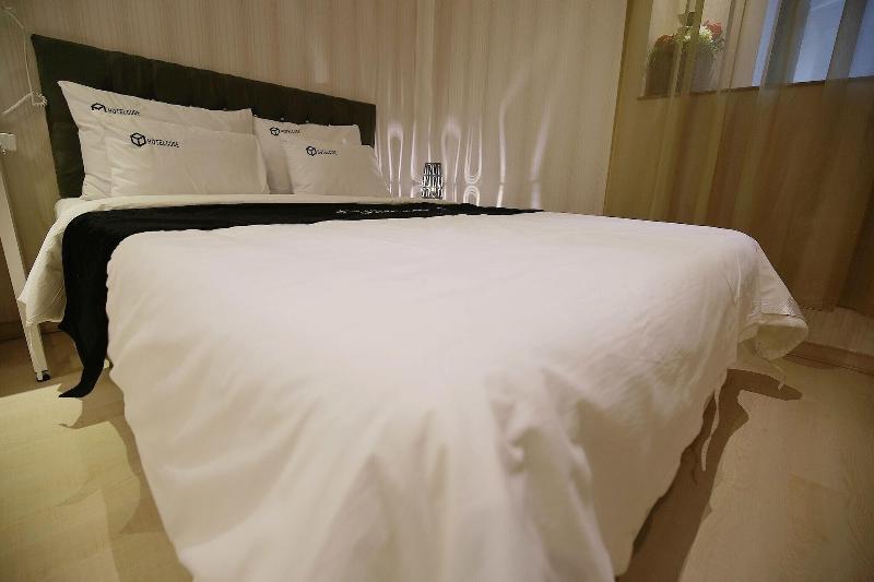 Asan Hotel Cube image