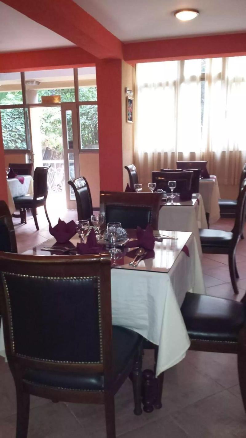 The Lions Den Hotel image