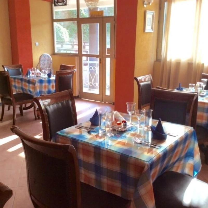 The Lions Den Hotel image