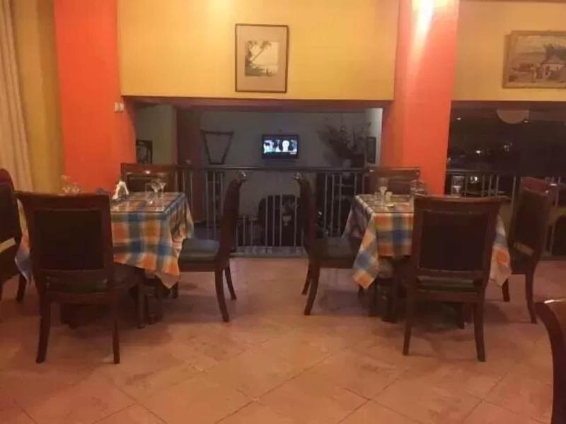 The Lions Den Hotel image