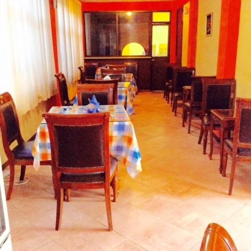 The Lions Den Hotel image