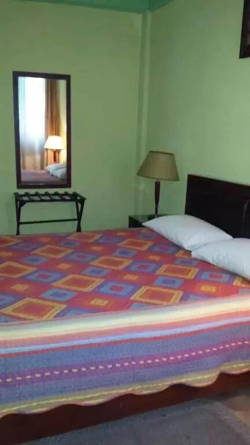 The Lions Den Hotel image