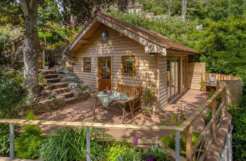 Porthole Log Cabin image