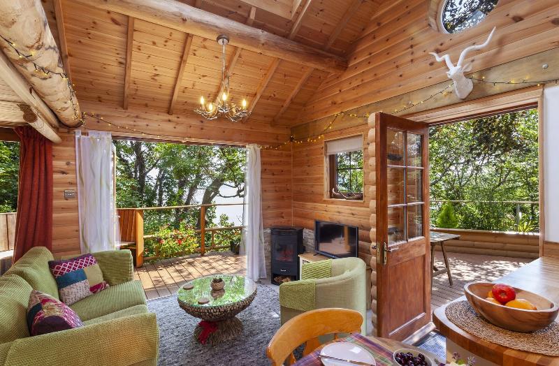 Porthole Log Cabin image