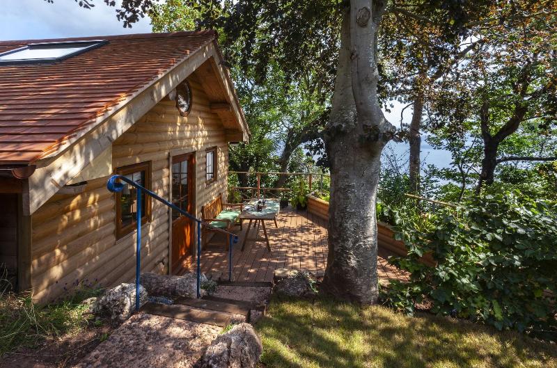 Porthole Log Cabin image