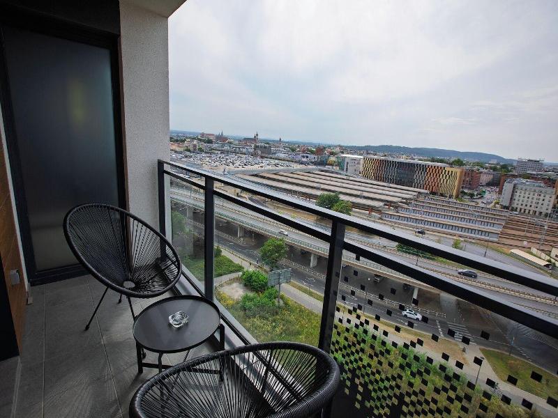 Glass House Hot Tub Apartments image