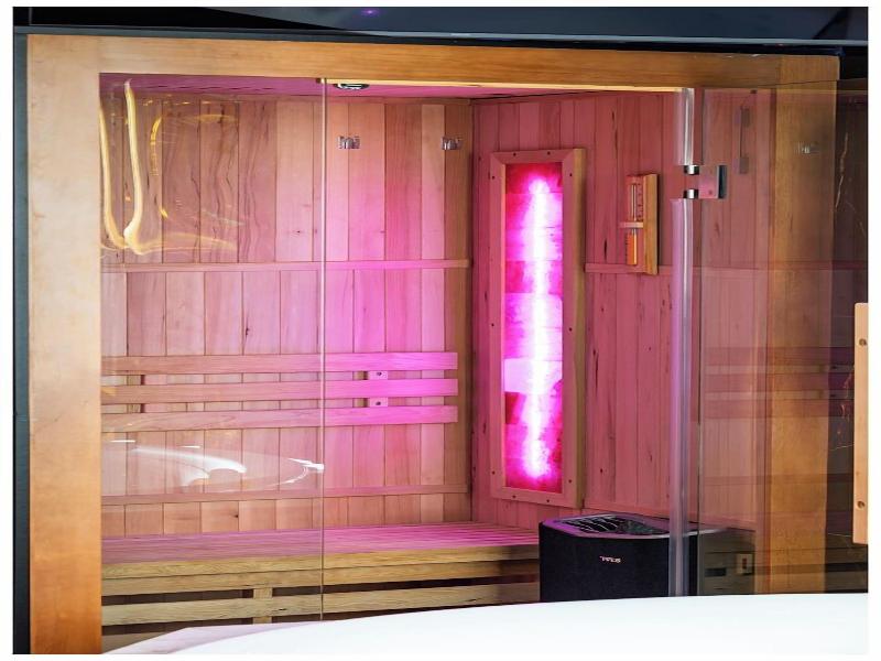 Glass House Hot Tub Apartments image
