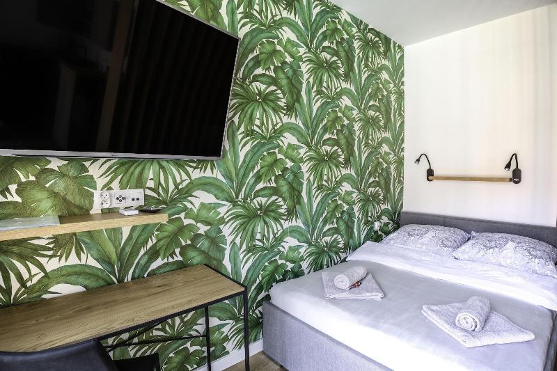 Glass House Hot Tub Apartments image