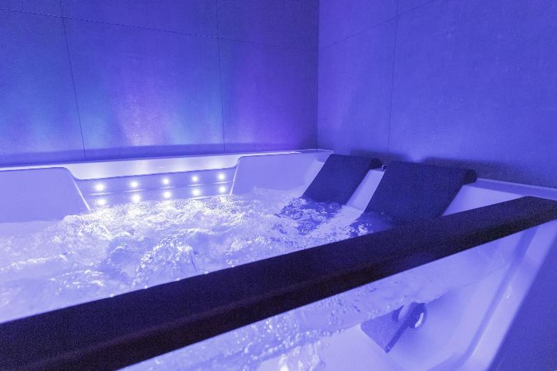 Glass House Hot Tub Apartments image