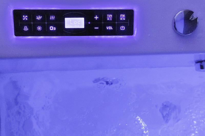 Glass House Hot Tub Apartments image