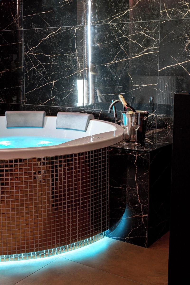 Glass House Hot Tub Apartments image