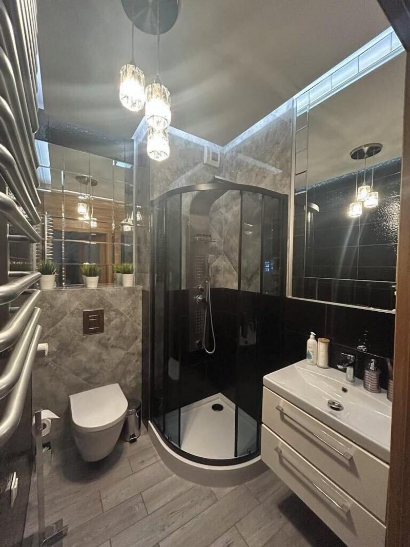 Glass House Hot Tub Apartments image