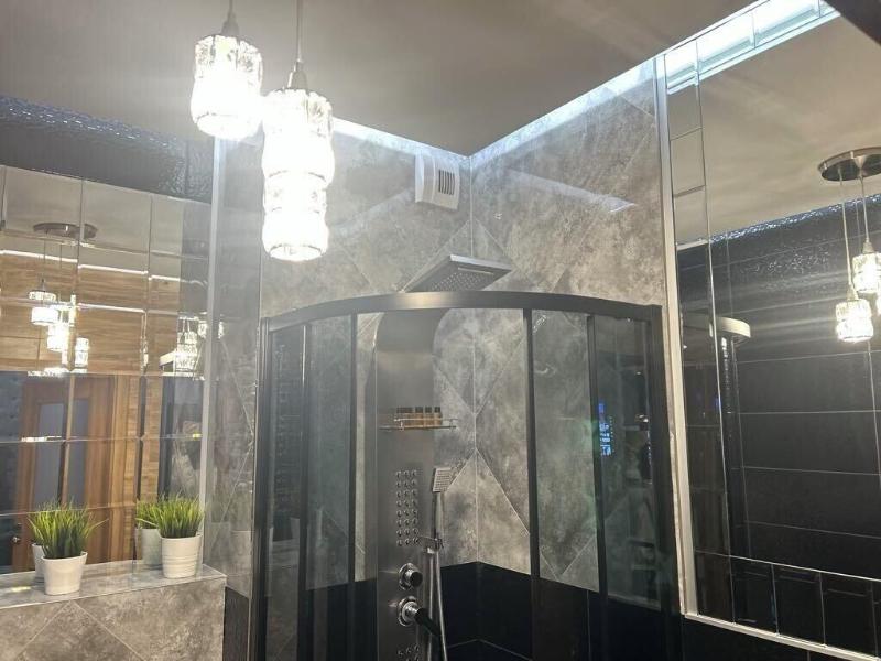 Glass House Hot Tub Apartments image