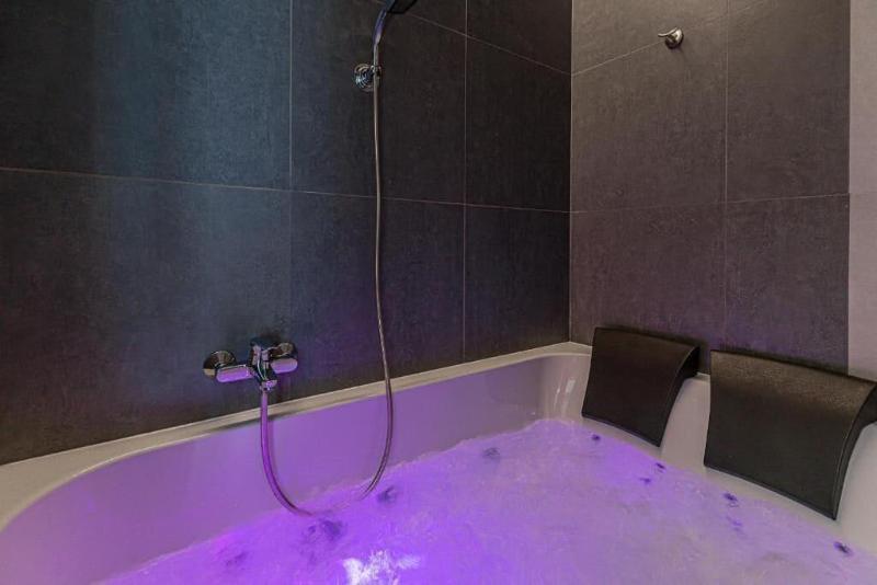 Glass House Hot Tub Apartments image