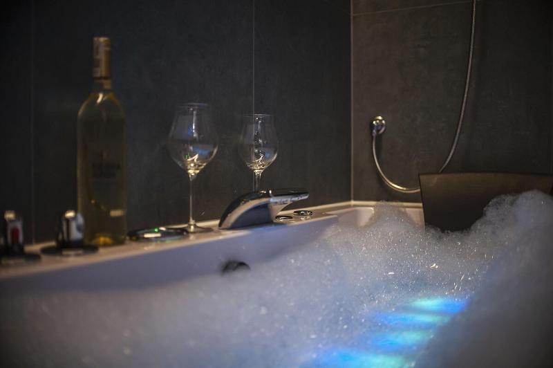 Glass House Hot Tub Apartments image