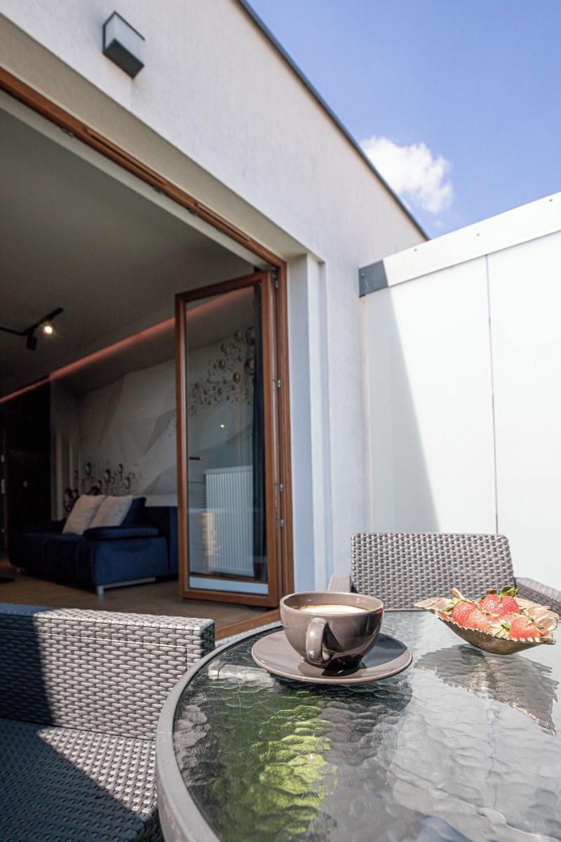 Glass House Hot Tub Apartments image