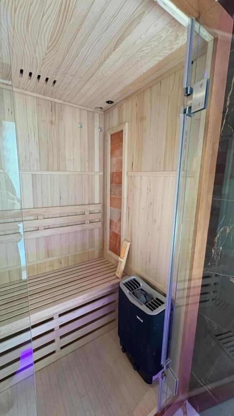Glass House Hot Tub Apartments image