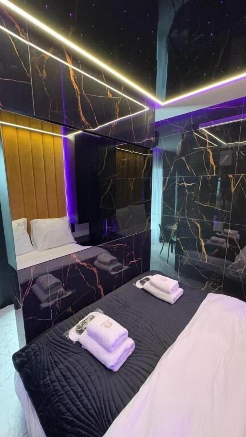 Glass House Hot Tub Apartments image