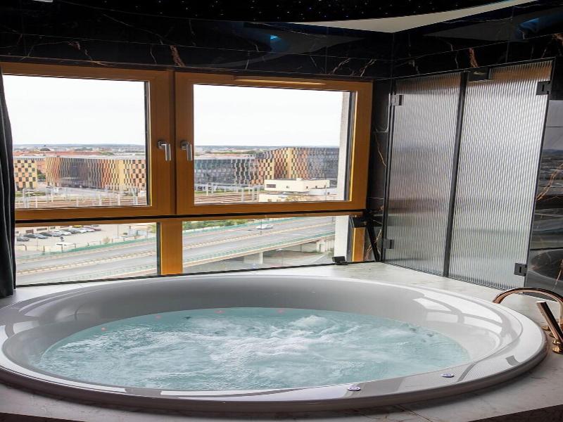 Glass House Hot Tub Apartments image