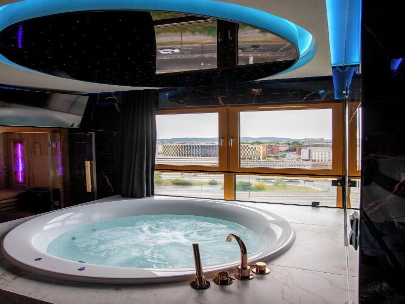 Glass House Hot Tub Apartments image