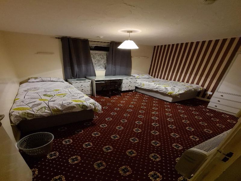The Coach House Rooms image