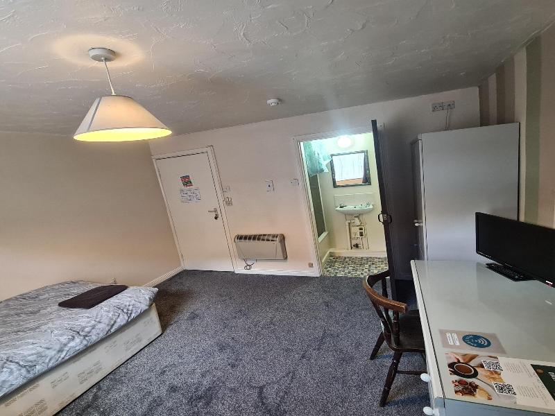 The Coach House Rooms image