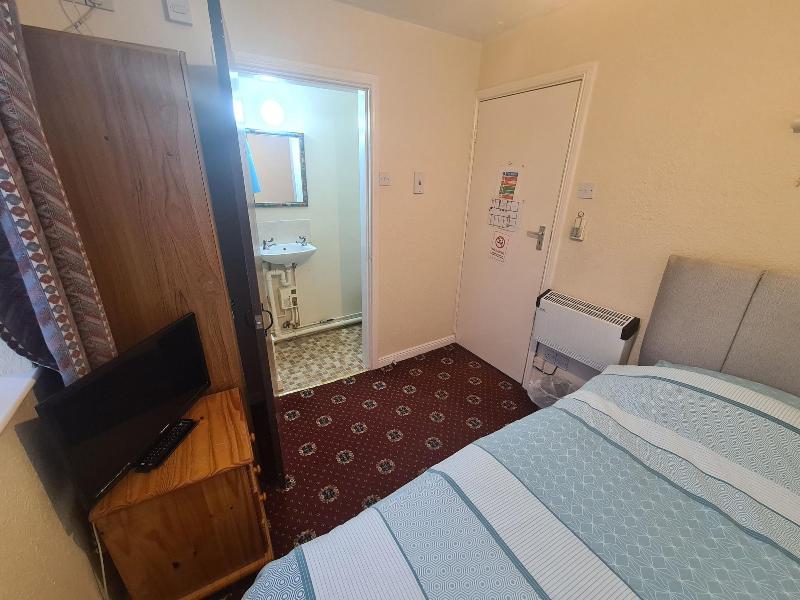 The Coach House Rooms image