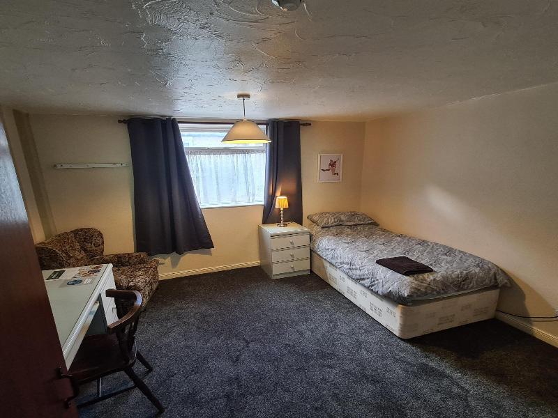 The Coach House Rooms image