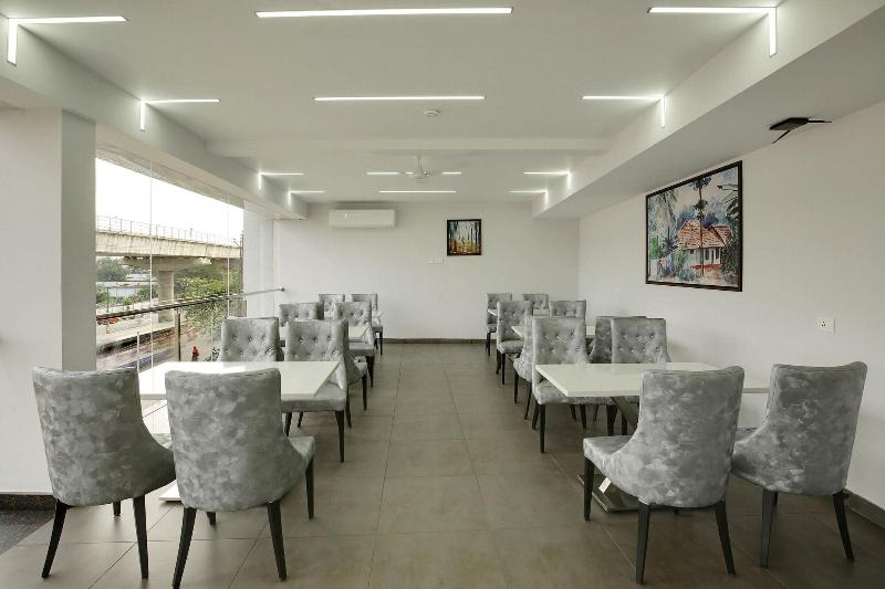 Capital O 22459 Edasserys Kalamassery Tourist Hom image